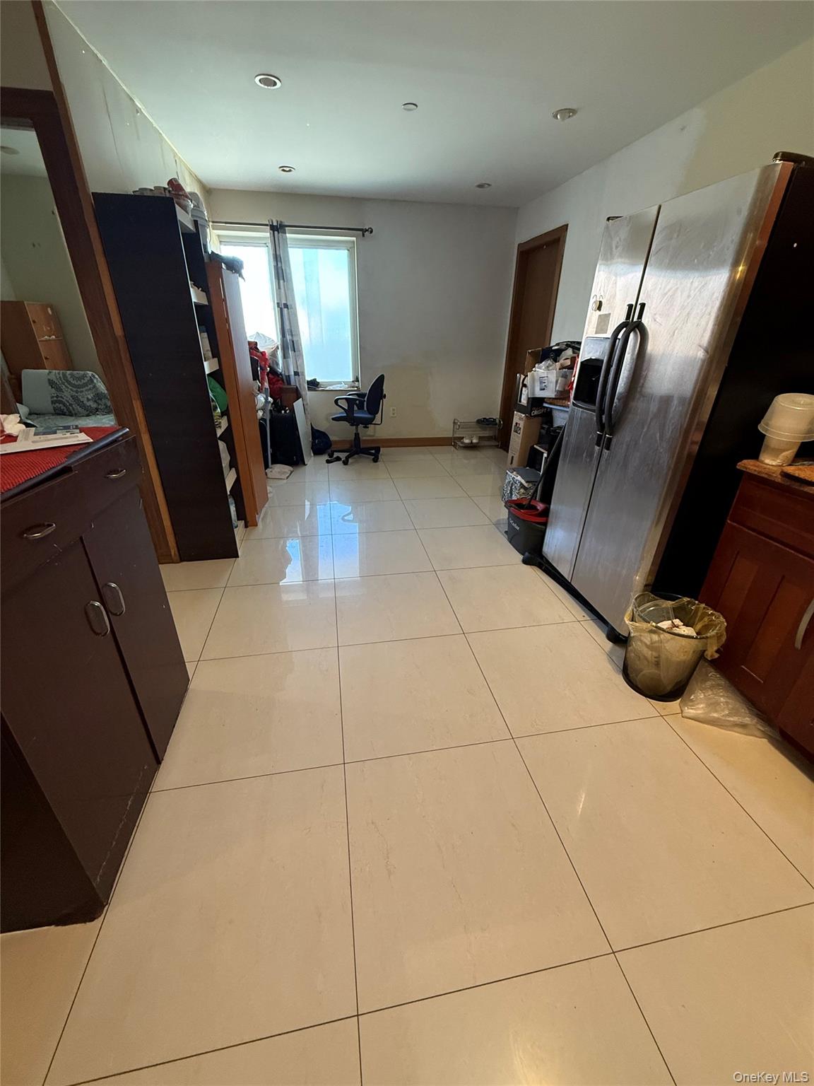 37-17 111th Street, Unit 2D Queens, NY 11368 - Photo 2 of 8 a living room with furniture