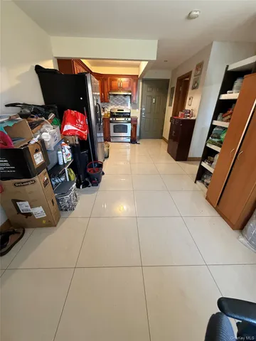 a view of a livingroom with furniture and garage