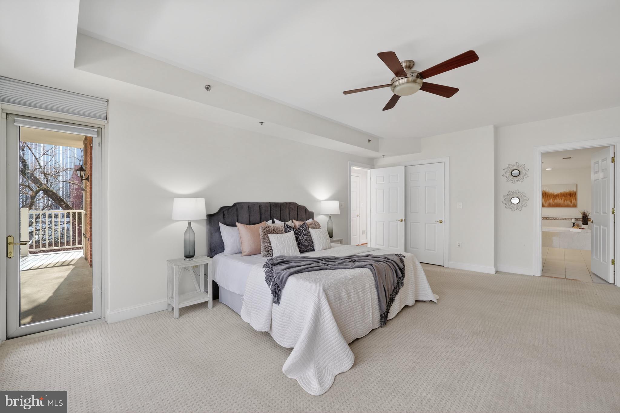 1555 North Colonial Terrace, Unit 601 Arlington, VA 22209 - Photo 14 of 24 a bedroom with bed and window