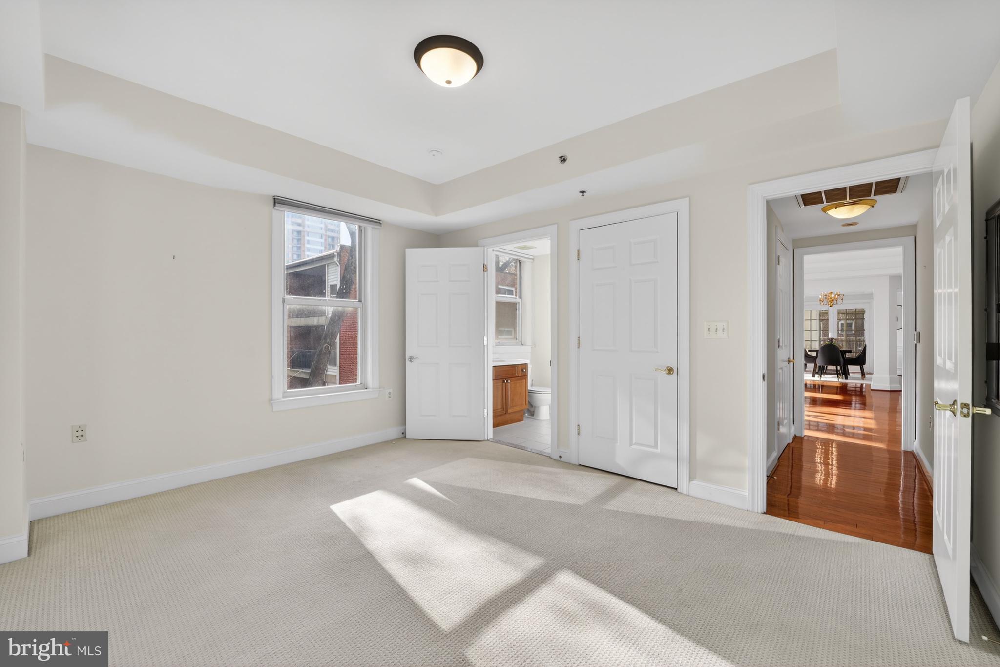 1555 North Colonial Terrace, Unit 601 Arlington, VA 22209 - Photo 18 of 24 an empty room with windows