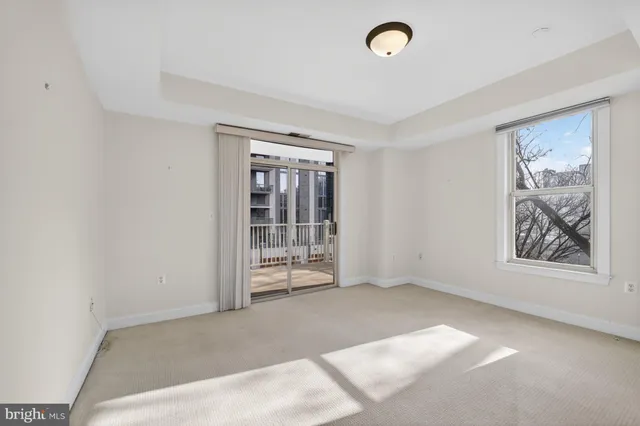 an empty room with windows