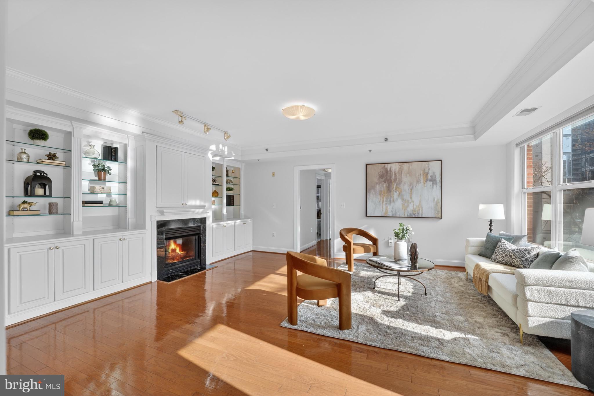 1555 North Colonial Terrace, Unit 601 Arlington, VA 22209 - Photo 5 of 24 a living room with furniture and a fireplace