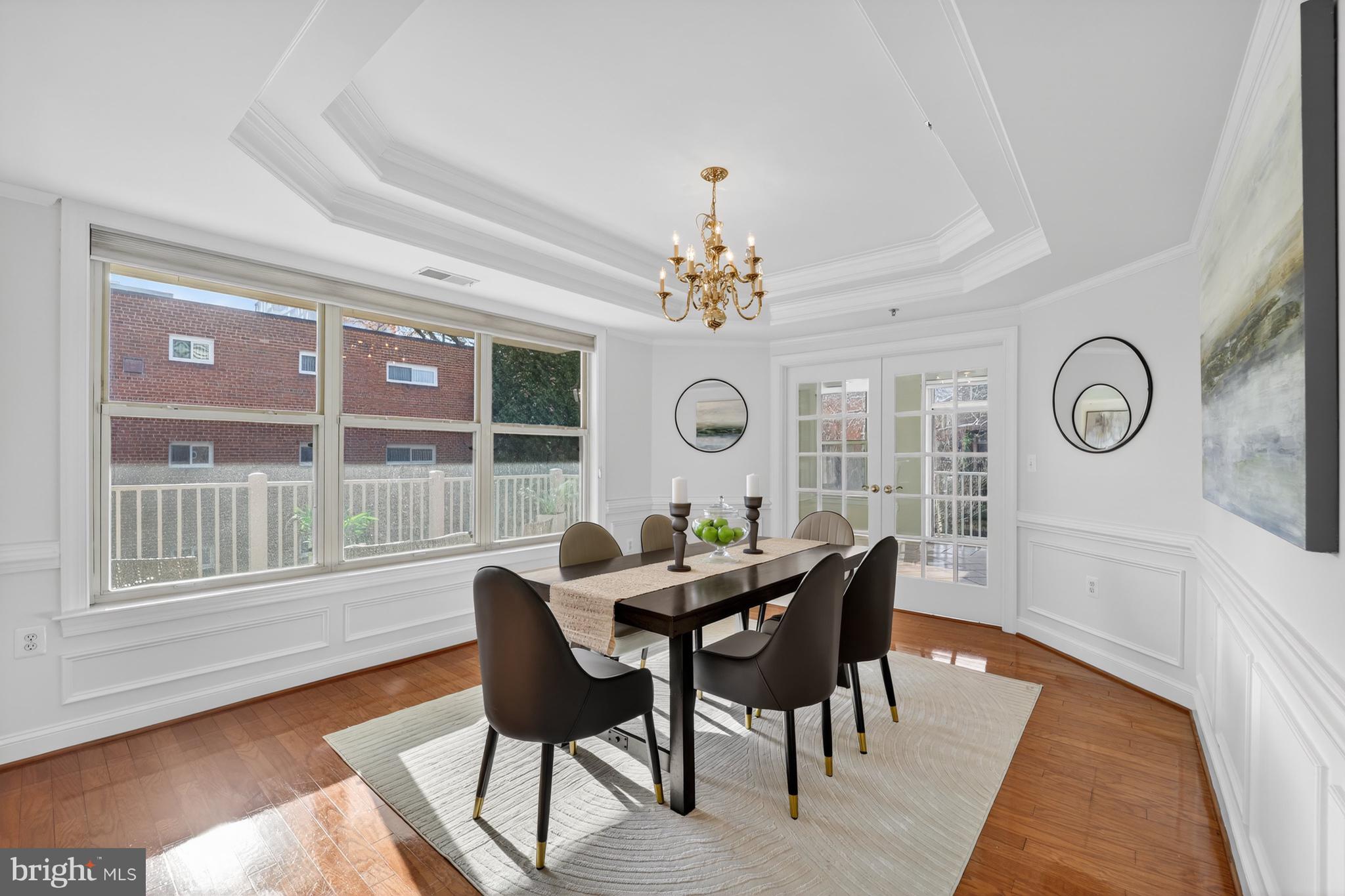 1555 North Colonial Terrace, Unit 601 Arlington, VA 22209 - Photo 7 of 24 a dining room with furniture and window