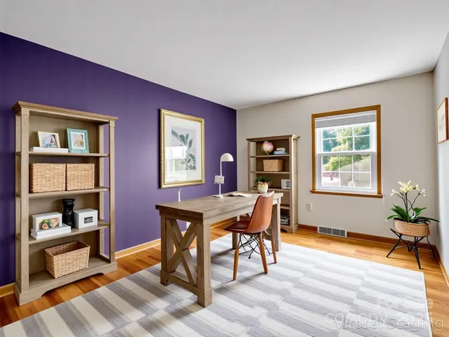 a workspace with furniture window and wooden floor