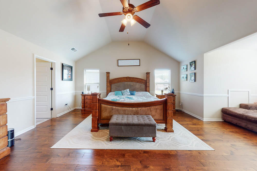6092 Rye Field Road Aiken, SC 29801 - Photo 15 of 34 Owners suite with vaulted ceiling, sitting area, & chair rail!