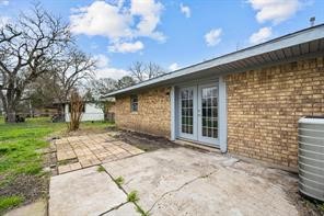1227 Fair Drive Angleton, TX 77515 - Photo 16 of 18 a view of a house with a yard