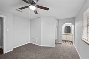 1227 Fair Drive Angleton, TX 77515 - Photo 9 of 18 wooden floor in an empty room with a window