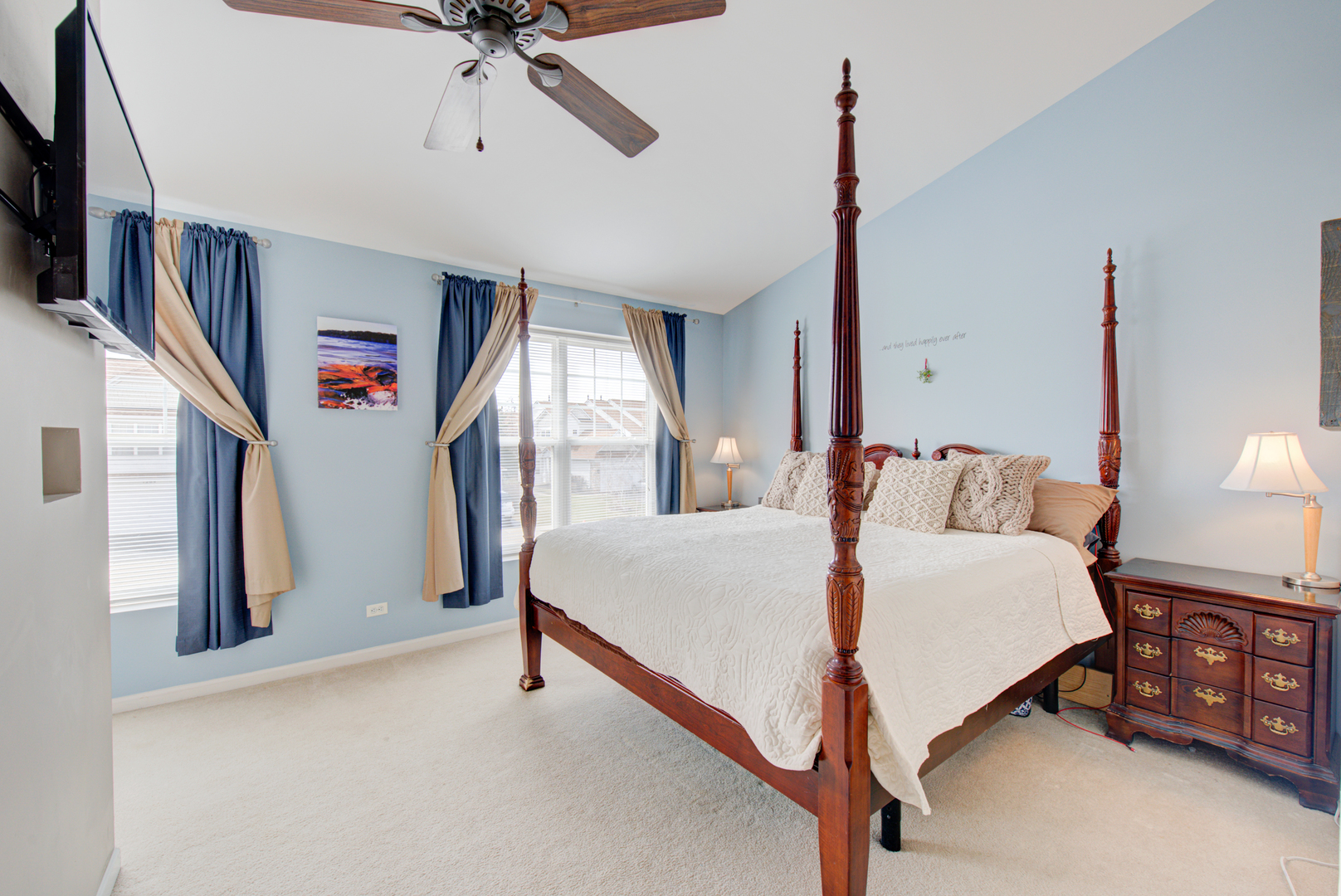 1201 Delta Drive Elgin, IL 60123 - Photo 19 of 42 a bed room with a bed and a chandelier