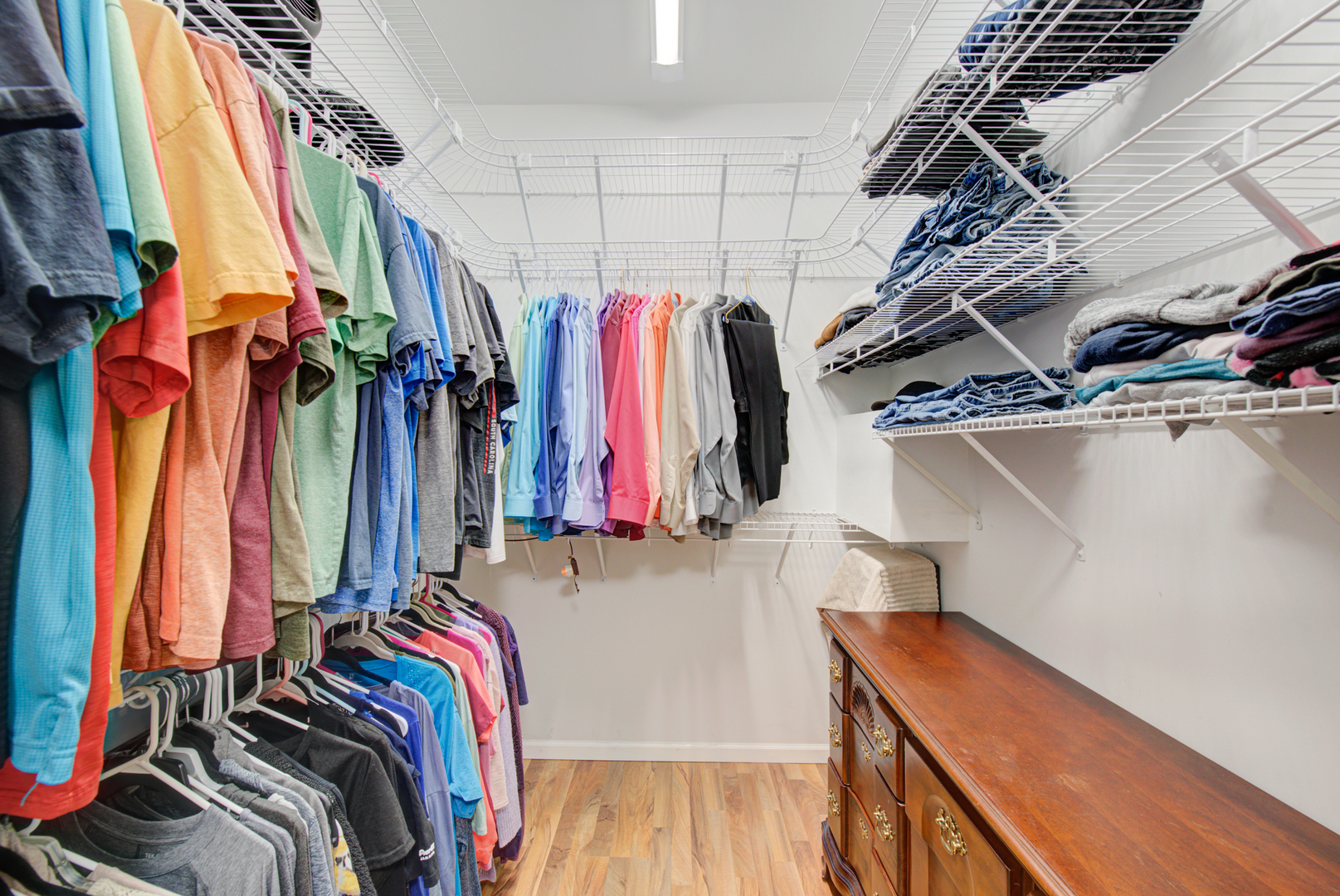 1201 Delta Drive Elgin, IL 60123 - Photo 24 of 42 a view of walk in closet with clothes