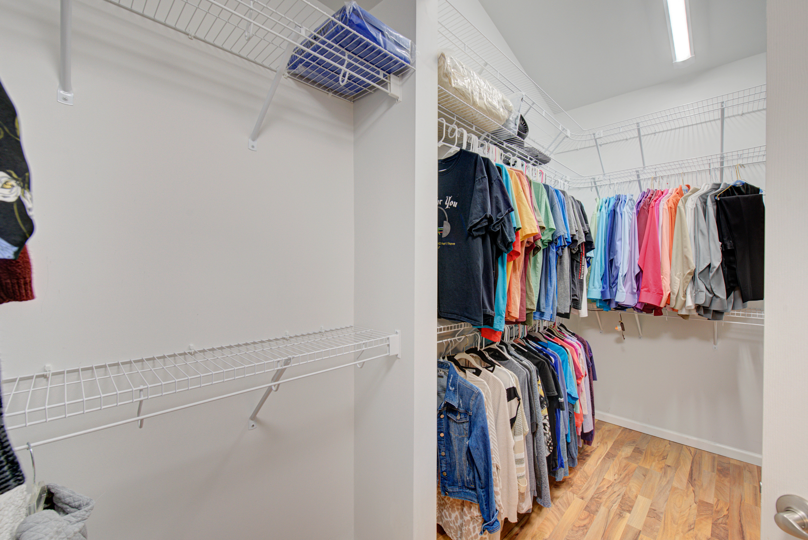 1201 Delta Drive Elgin, IL 60123 - Photo 25 of 42 a view of walk in closet with clothes
