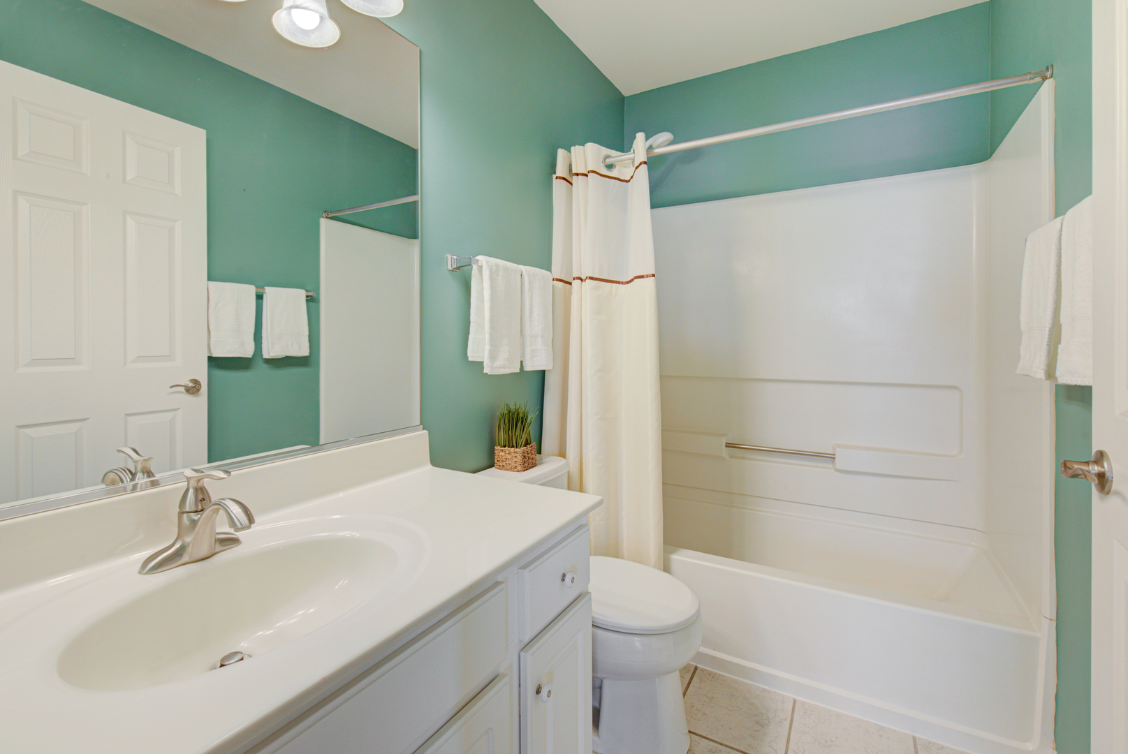 1201 Delta Drive Elgin, IL 60123 - Photo 30 of 42 a bathroom with a sink and a mirror