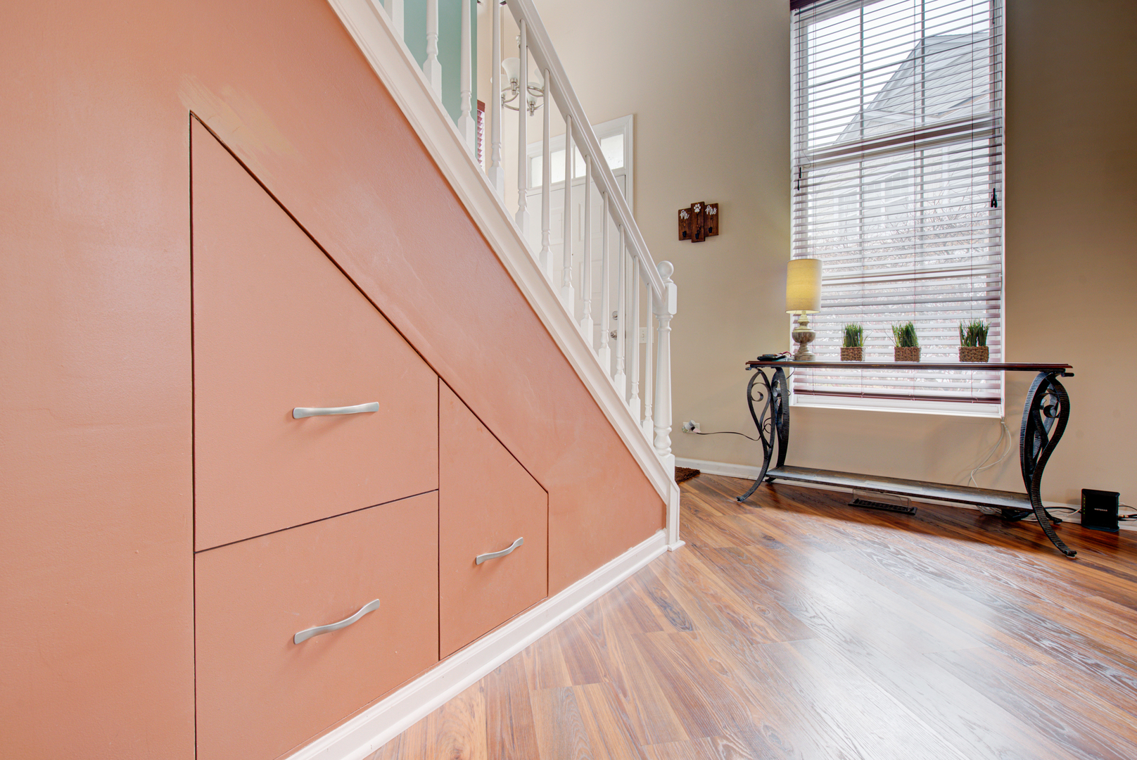 1201 Delta Drive Elgin, IL 60123 - Photo 32 of 42 a view of a livingroom with wooden floor and a staircase