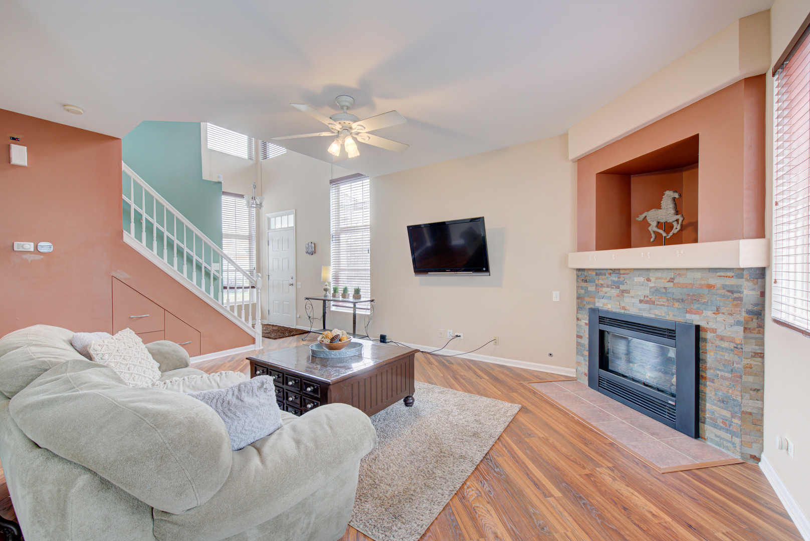 1201 Delta Drive Elgin, IL 60123 - Photo 4 of 42 a living room with furniture fireplace and flat screen tv