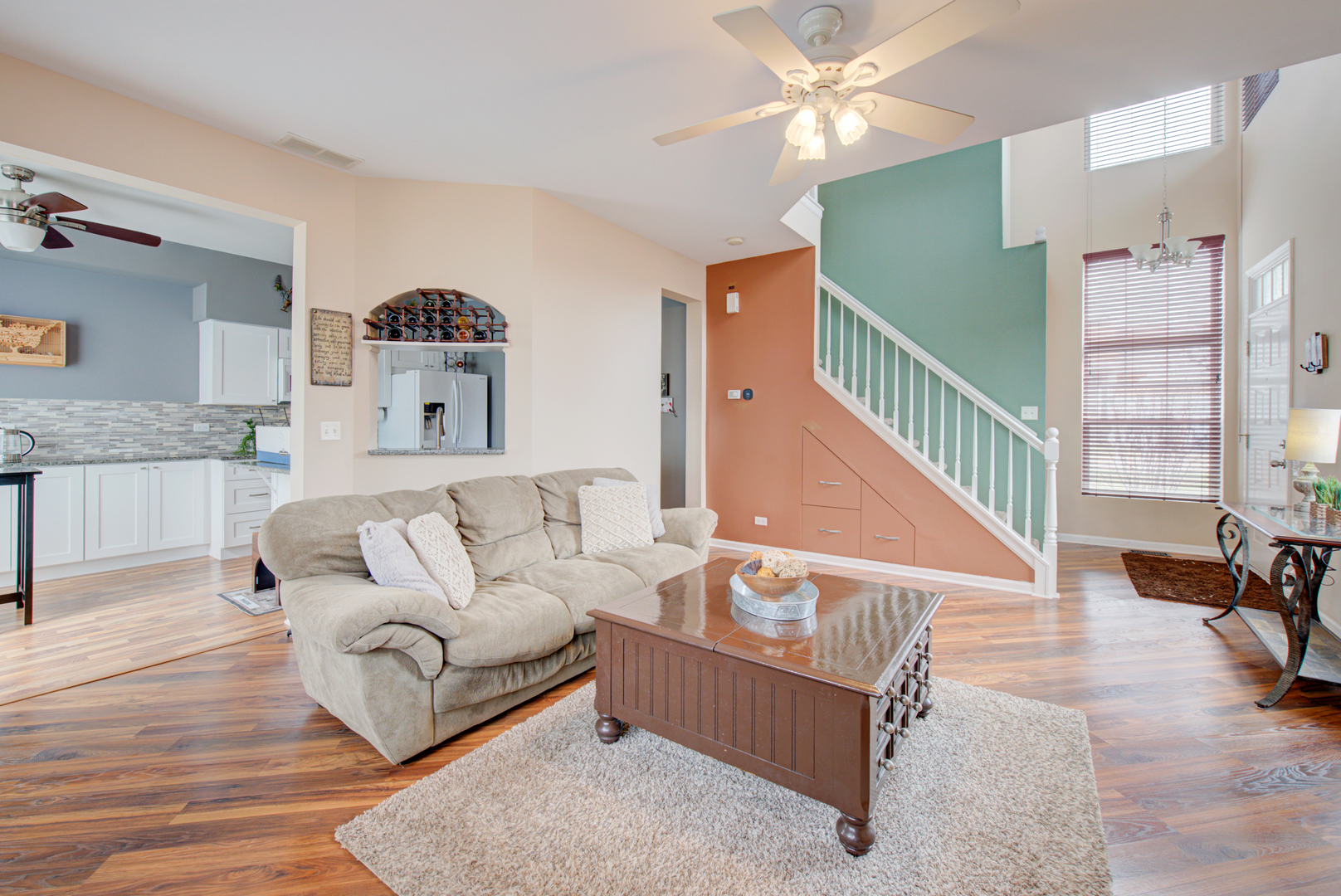 1201 Delta Drive Elgin, IL 60123 - Photo 6 of 42 a living room with furniture and a chandelier