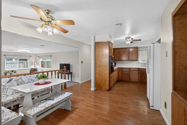a kitchen with stainless steel appliances a stove microwave and cabinets