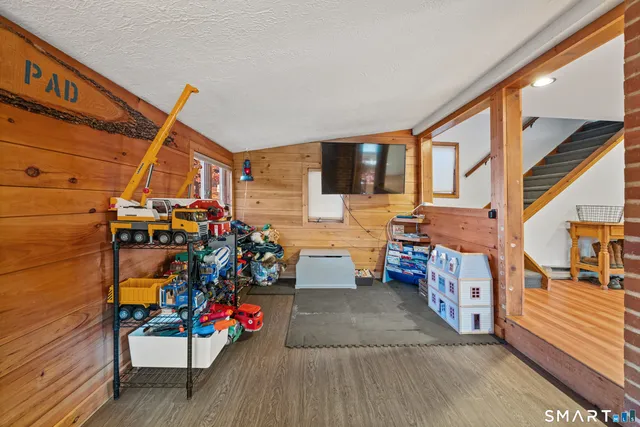 a bathroom with a sink toilet and mirror