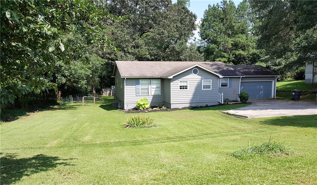 Perfect little ranch sits on a beautiful 1 Acre level lot!  Ready for whatever you have in mind!