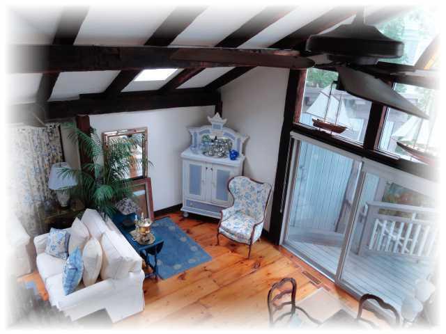 9 Chart Way Mashpee, MA 02649 - Photo 25 of 32 a living room with furniture and wooden floor