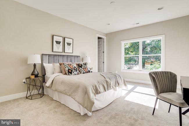 1829 Griffith Road Falls Church, VA 22043 - Photo 12 of 34 a bedroom with a bed and a chair