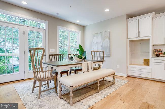 1829 Griffith Road Falls Church, VA 22043 - Photo 14 of 34 a living room with furniture a table and a large window