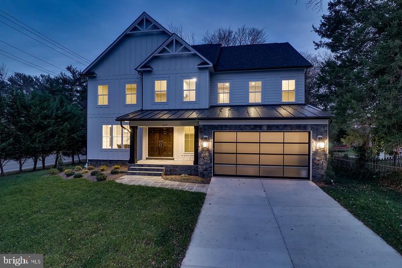 1829 Griffith Road Falls Church, VA 22043 - Photo 20 of 34 a front view of a house with a yard and garage