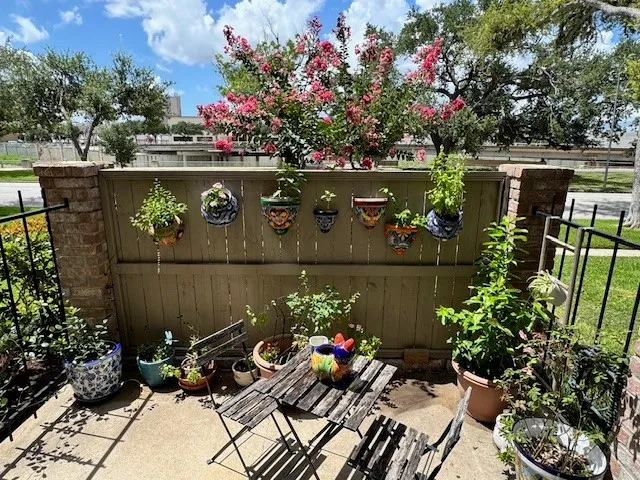 a living room with furniture and a gate