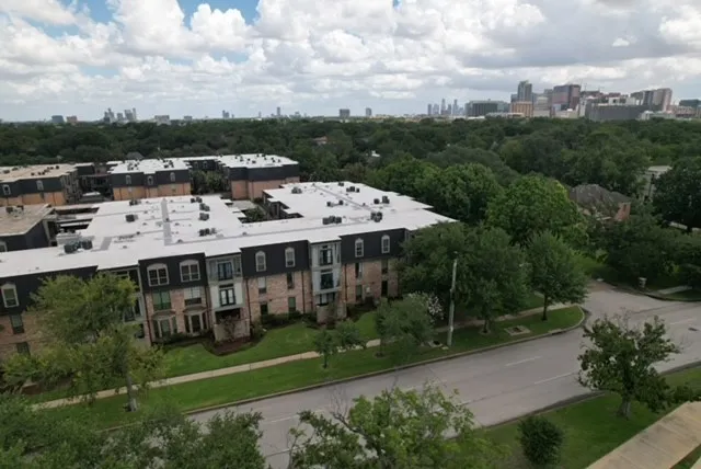a view of a big yard next to a building