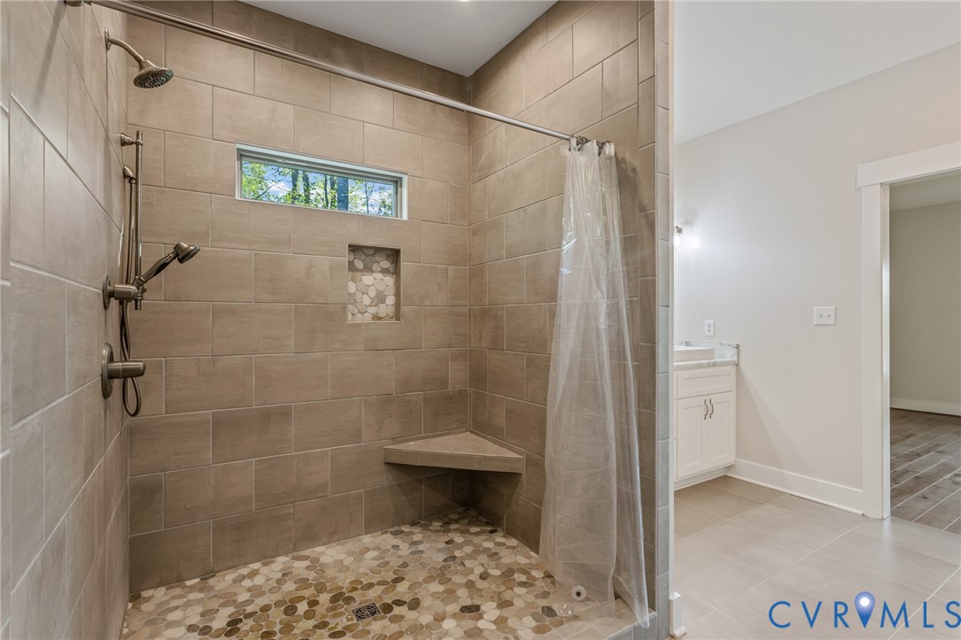 2516 Miry Run Road Sutherland, VA 23885 - Photo 23 of 45 a bathroom with a shower and a toilet