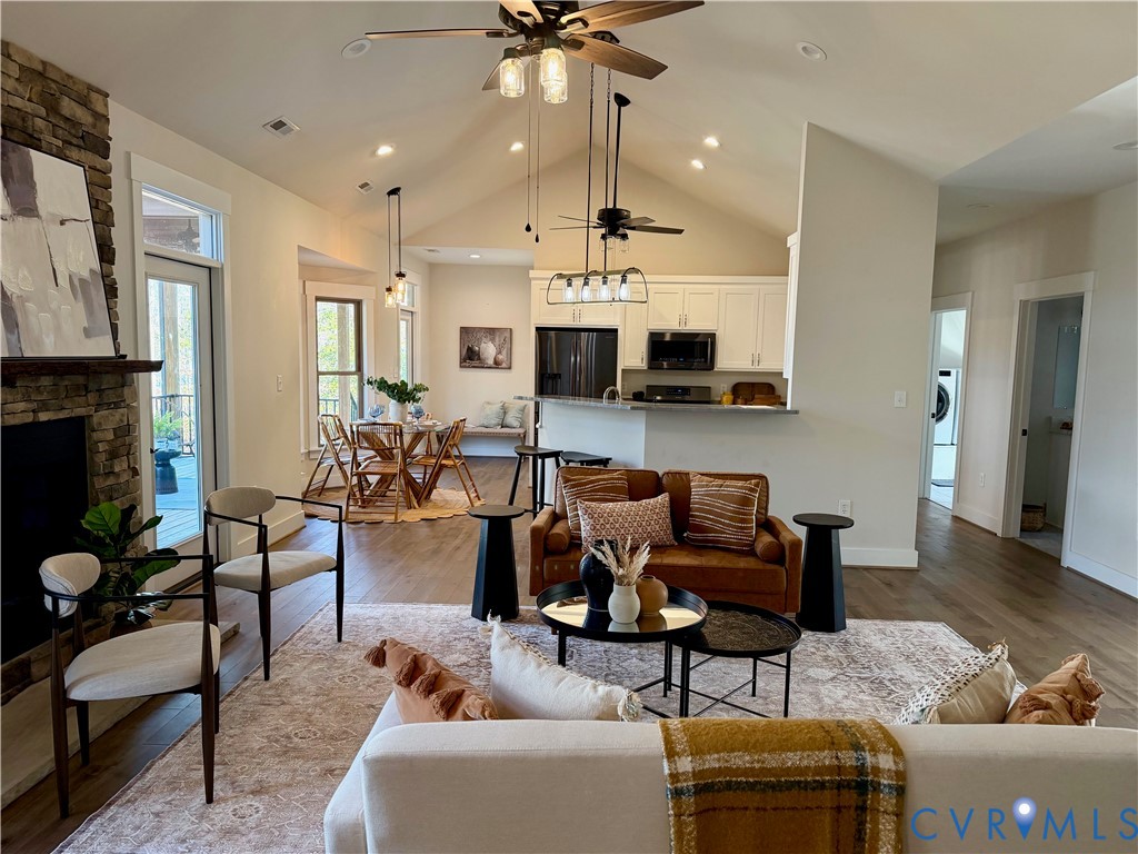 2516 Miry Run Road Sutherland, VA 23885 - Photo 24 of 45 a living room with furniture and a fireplace