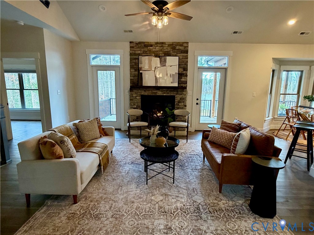 2516 Miry Run Road Sutherland, VA 23885 - Photo 25 of 45 a living room with furniture and a chandelier