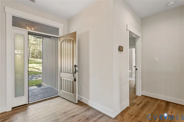 a spacious bathroom with a sink a mirror and a vanity