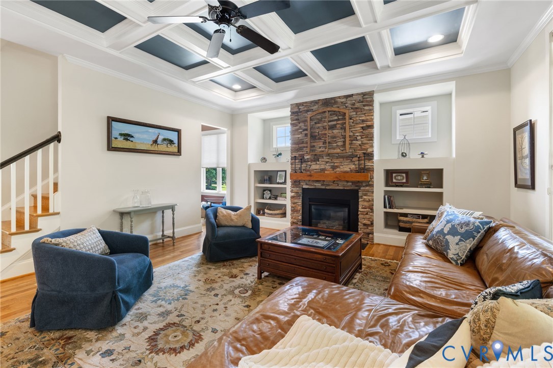 15936 Alsdell Road Midlothian, VA 23112 - Photo 20 of 45 Living area featuring a stone-clad fireplace with