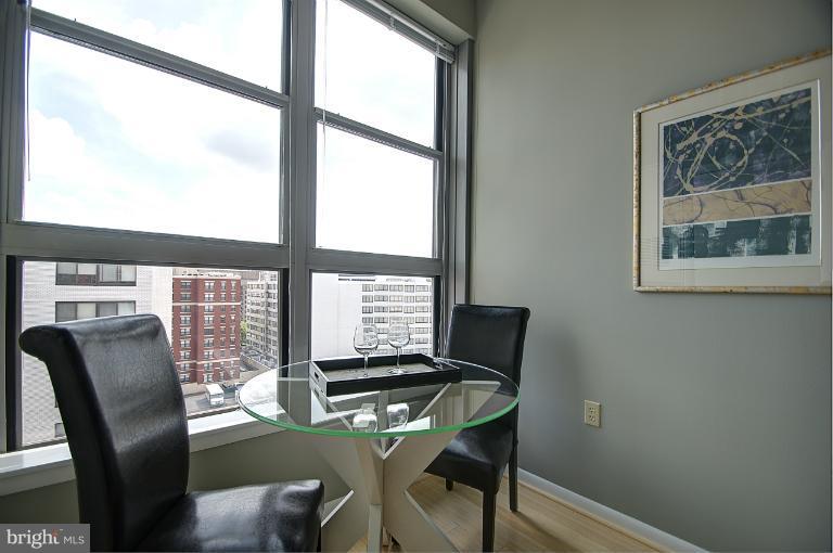 1300 N Street Northwest, Unit 812 Washington, DC 20005 - Photo 11 of 30 a view of a dining room with furniture window and outside view
