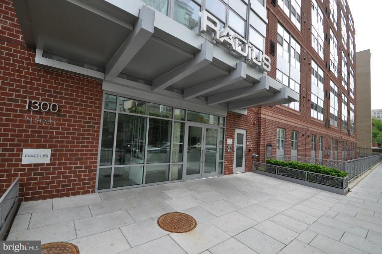 1300 N Street Northwest, Unit 812 Washington, DC 20005 - Photo 19 of 30 a view of a brick house with a large windows