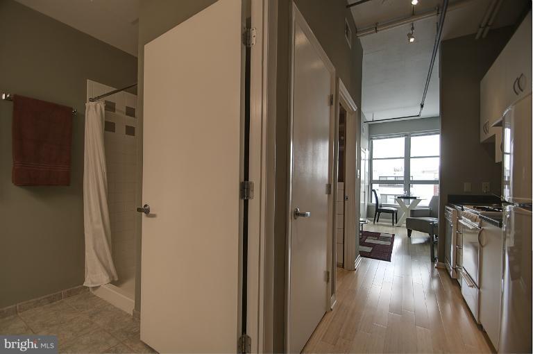1300 N Street Northwest, Unit 812 Washington, DC 20005 - Photo 6 of 30 a view of living room with furniture and flat screen tv