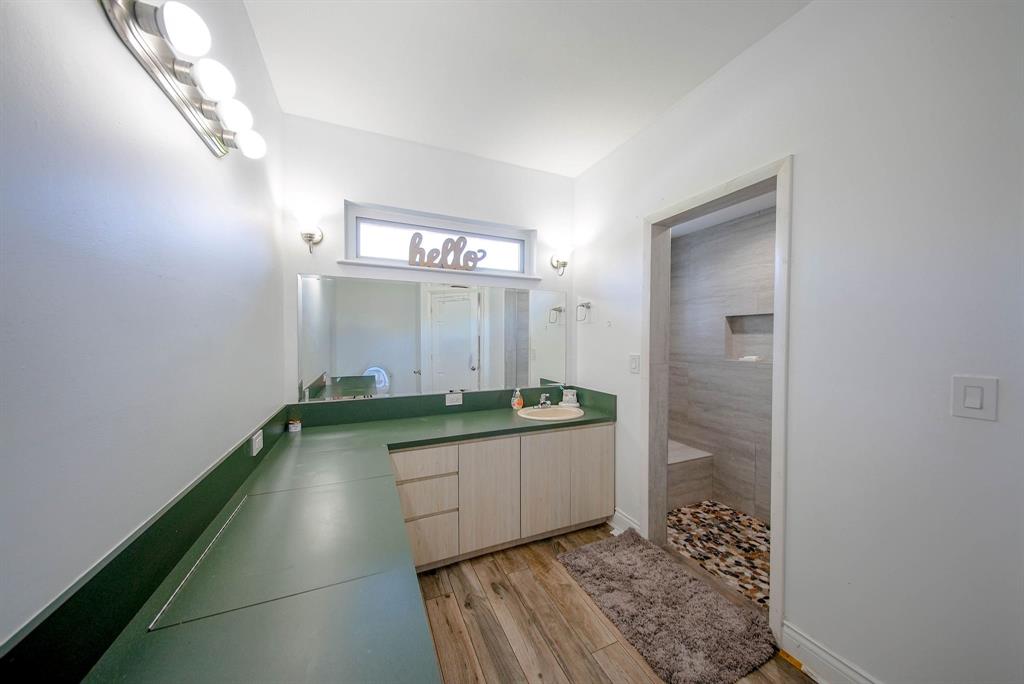 241 Southwest 129th Avenue Miami, FL 33184 - Photo 12 of 27 a bathroom with a sink a toilet and shower