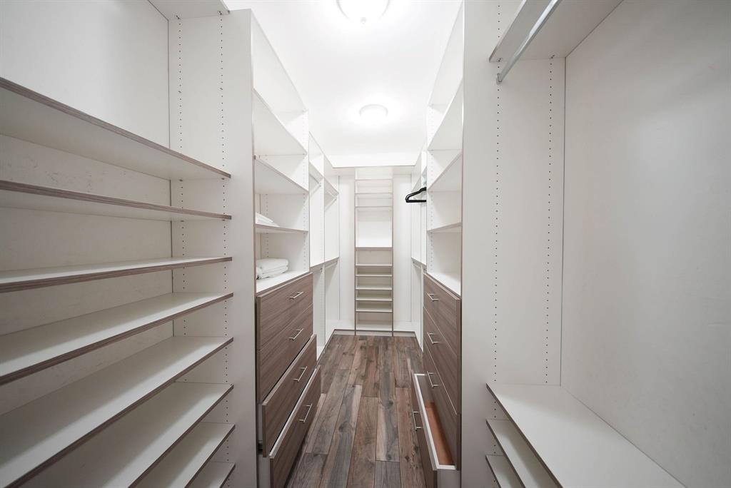 241 Southwest 129th Avenue Miami, FL 33184 - Photo 13 of 27 a view of walk in closet with empty racks