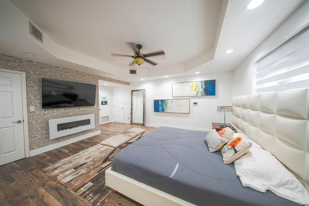 241 Southwest 129th Avenue Miami, FL 33184 - Photo 14 of 27 a bedroom with furniture and a flat screen tv