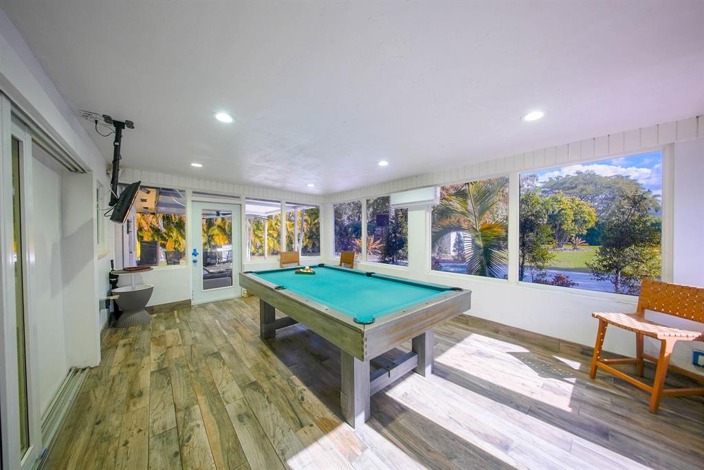 241 Southwest 129th Avenue Miami, FL 33184 - Photo 19 of 27 a room with pool table and windows