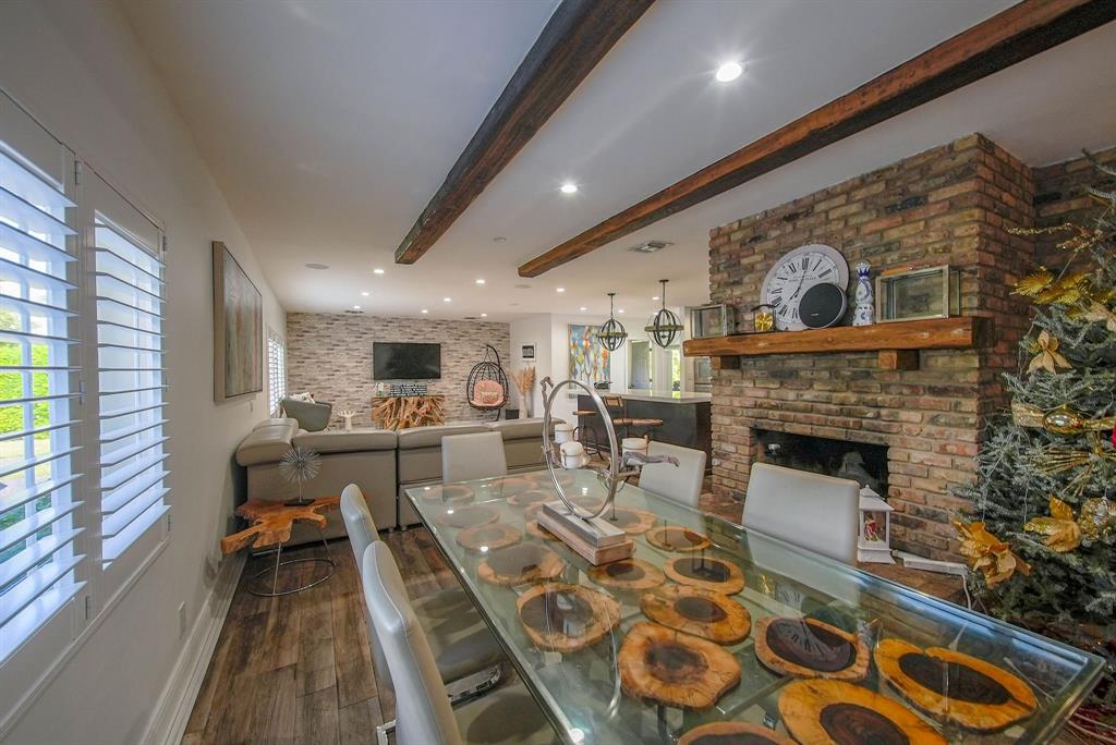 241 Southwest 129th Avenue Miami, FL 33184 - Photo 5 of 27 a living room with furniture and a fireplace