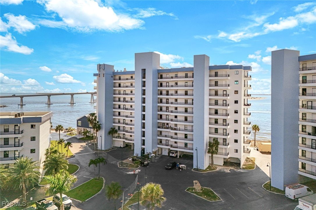 15011 Punta Rassa Road, Unit 505 Fort Myers, FL 33908 - Photo 3 of 40 a city view with tall buildings