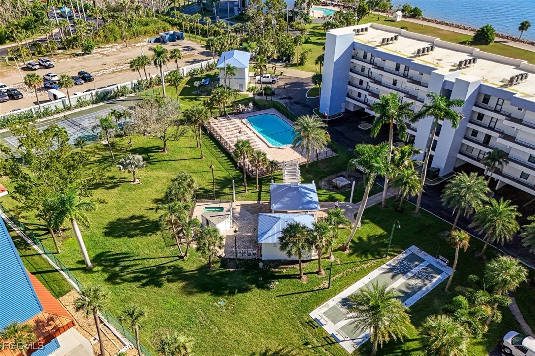 15011 Punta Rassa Road, Unit 505 Fort Myers, FL 33908 - Photo 37 of 40 an aerial view of a house with a garden and lake view