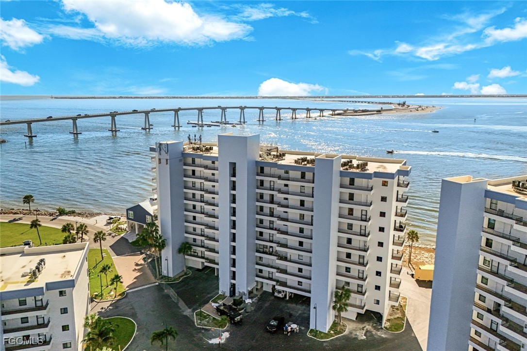 15011 Punta Rassa Road, Unit 505 Fort Myers, FL 33908 - Photo 38 of 40 a view of building with outdoor space