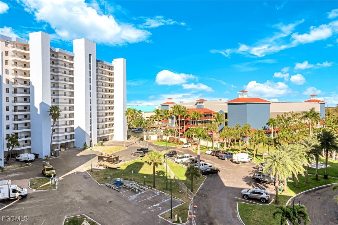 15011 Punta Rassa Road, Unit 505 Fort Myers, FL 33908 - Photo 6 of 40 a view of a city with tall buildings