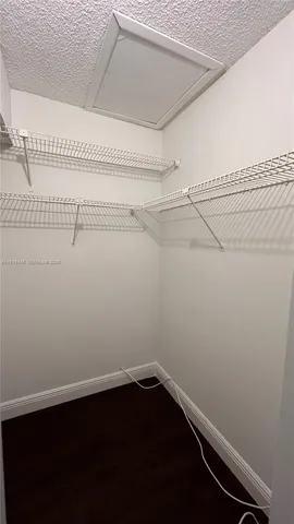 a view of a room with racks on the wall