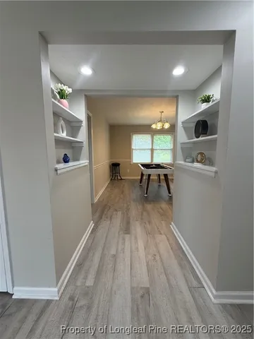 a view of a living room and dining room