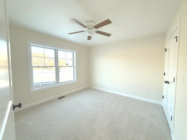 a bathroom with a sink a mirror and a bathtub