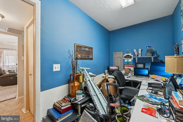 a bedroom with furniture and a bed