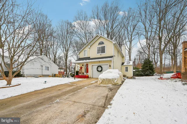 a backyard of a house with seating space