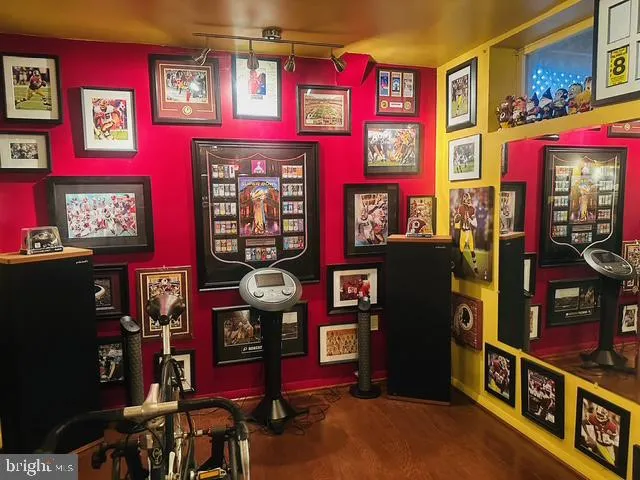 a view of a house with a yard and roof